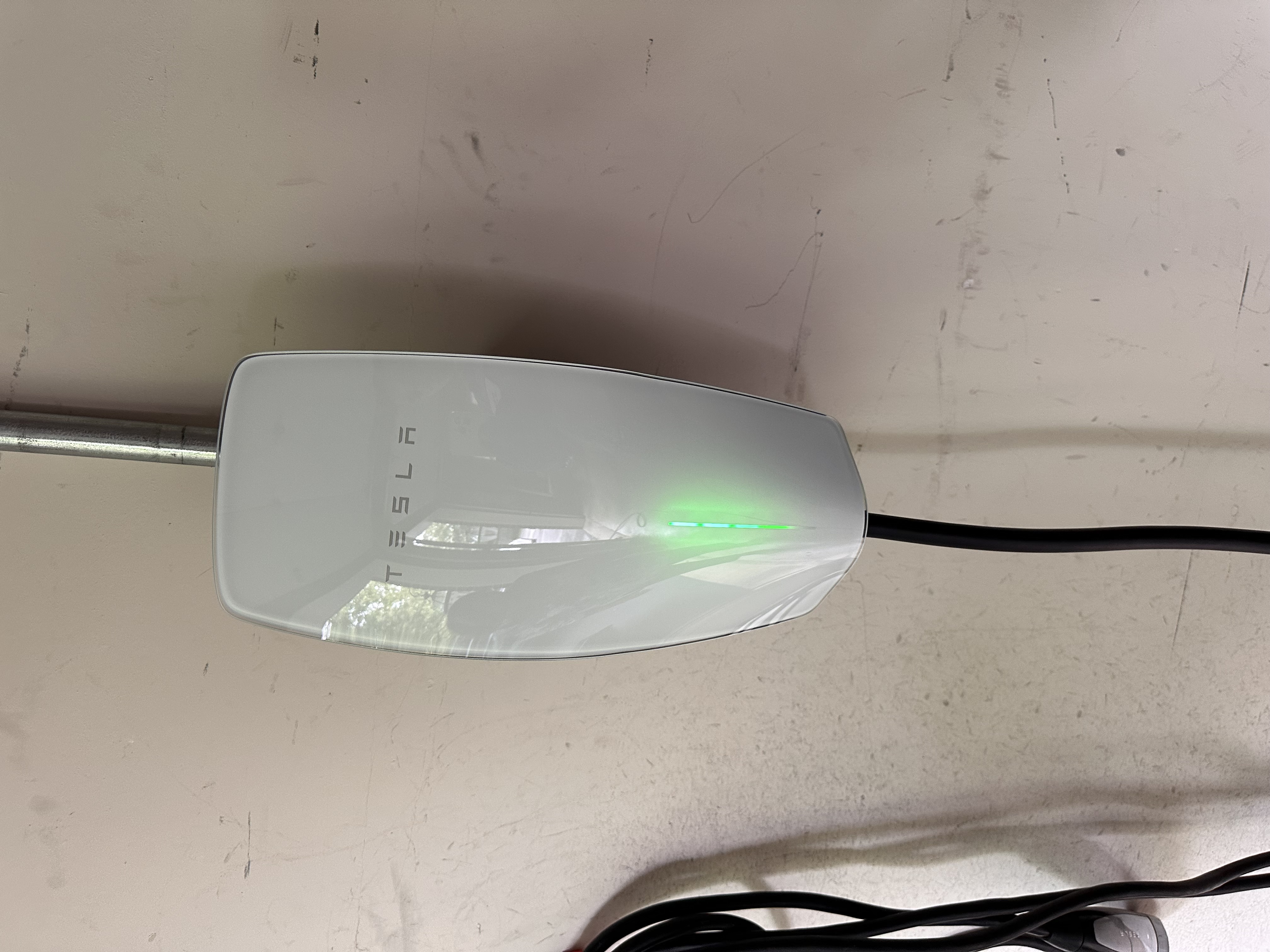 Tesla Wall Connector installation — Level 2 EV charger wired and mounted by EV-Electric Services