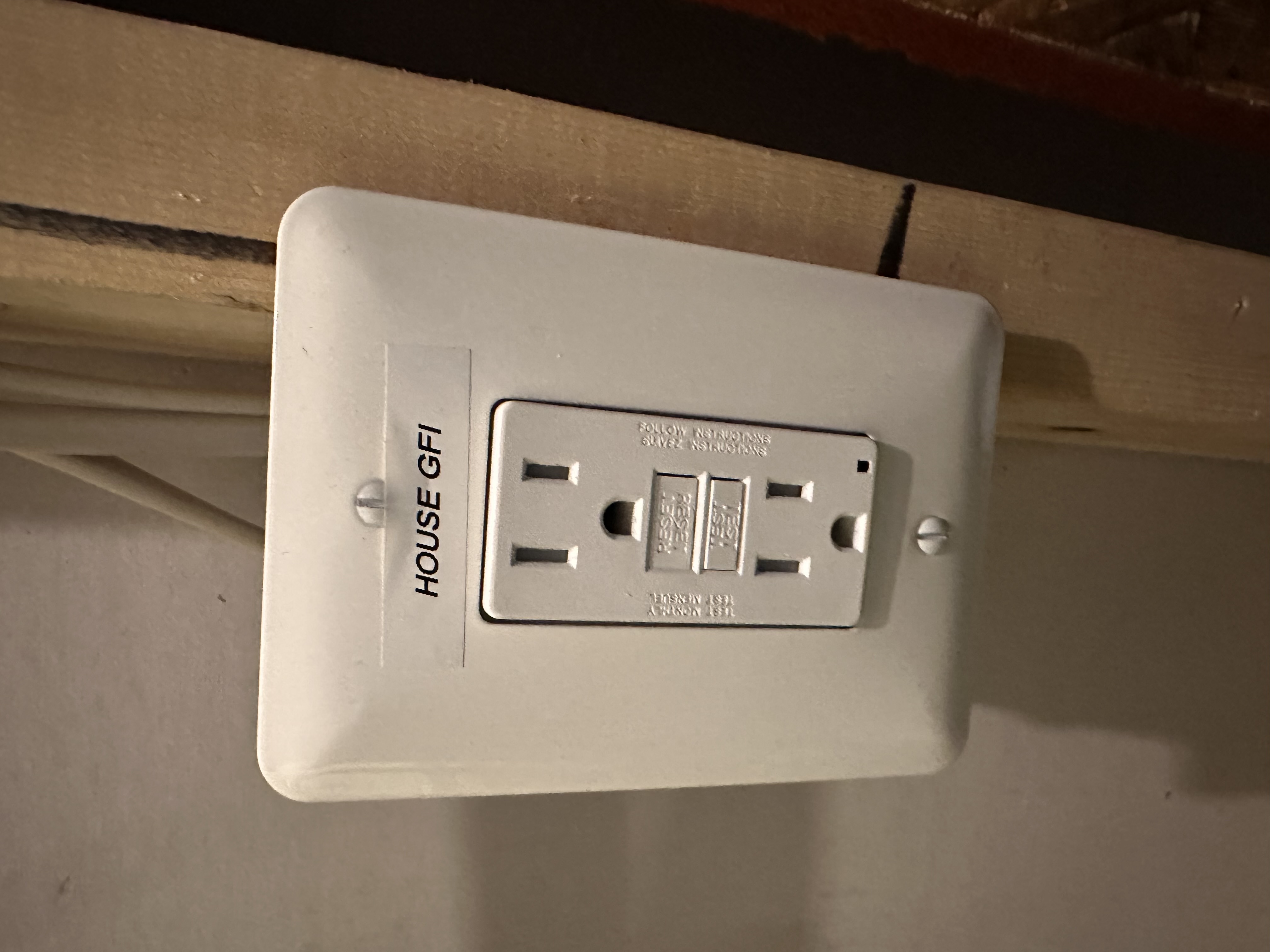 GFCI outlet and electrical panel inspection in a residential basement — EV-Electric Services