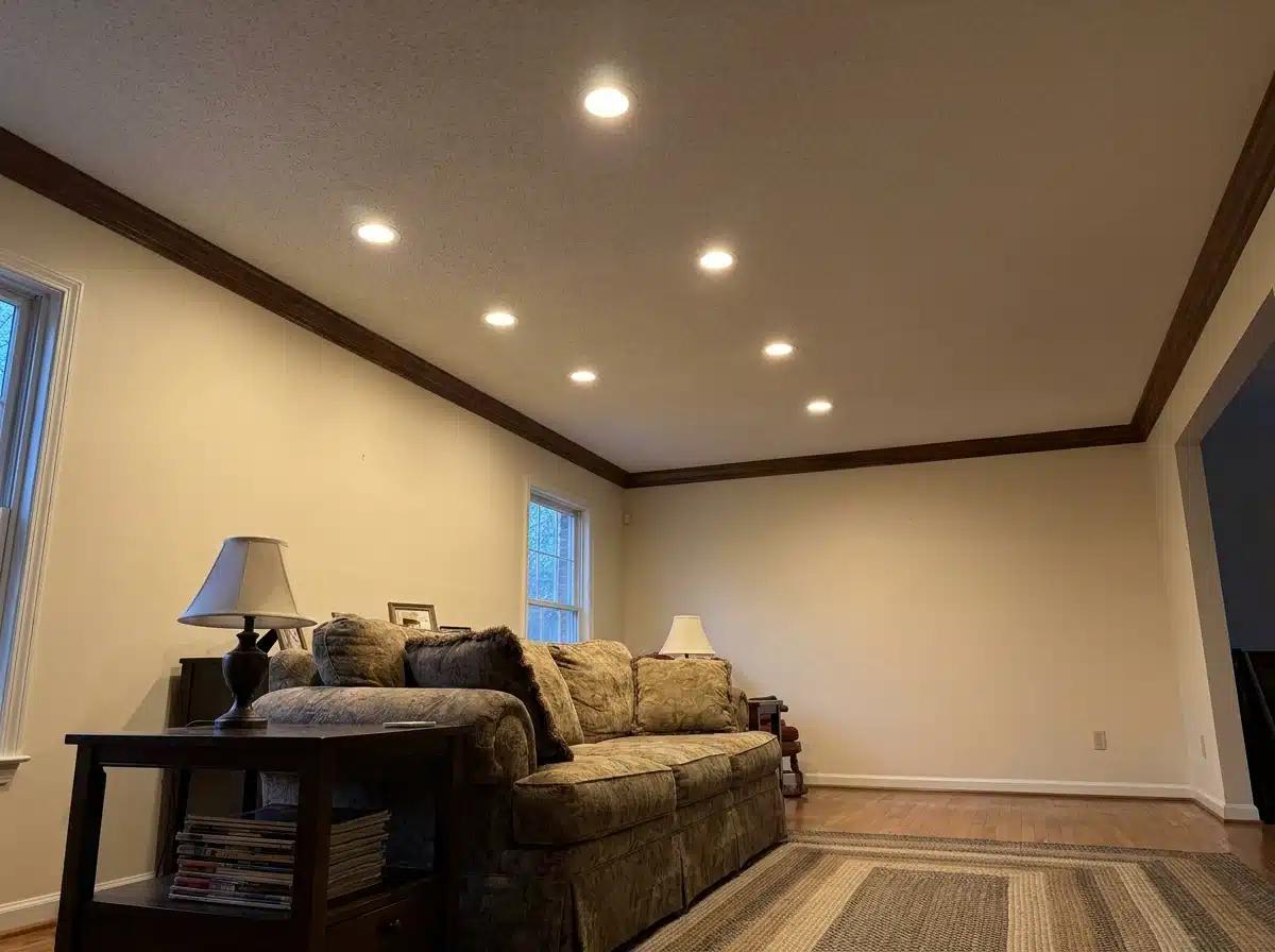 Recessed LED lighting installed in a Northern Virginia family room, six cans evenly spaced across the ceiling